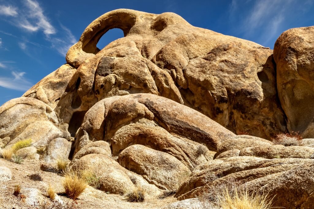 Tent nestled among stone spires at City of Rocks, geological camping in Idaho.